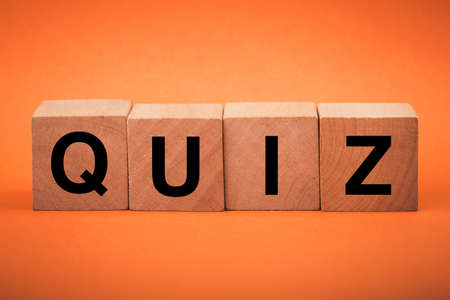 Quiz concept wooden blocks isolated on beautiful background.の写真素材