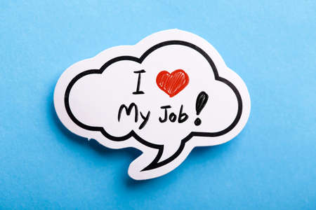 I Love My Job concept speech bubble isolated on blue background.の写真素材