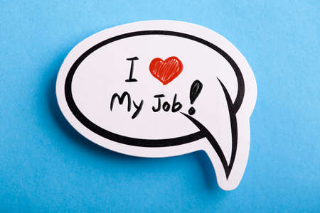 I Love My Job concept speech bubble isolated on blue background.の写真素材