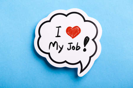 I Love My Job concept speech bubble isolated on blue background.の写真素材