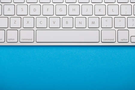 Top view of white keyboard with blank copy space.の写真素材