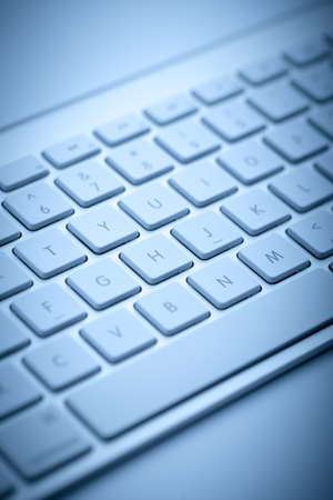 Closeup shot of keyboard with blue color.の写真素材