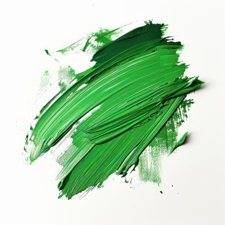 Green paint brush strokes isolated on white background. Acrylic colors.の素材