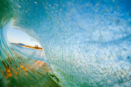 Inside out view of a wave breaking at Campeche beach in Florian?polis Brazilの写真素材