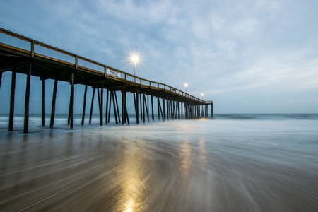 Ocean City, Maryland Pier during a Warm Fall Nightの写真素材