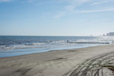 Beach in Atlantic City, New Jersey with boardwalk in backgroundの写真素材