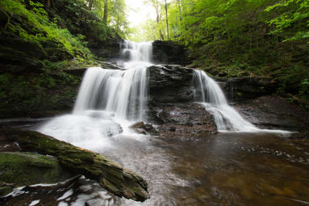 Scenic Waterfall in Ricketts Glen State Park in The Poconos in Pennsylvaniaの写真素材