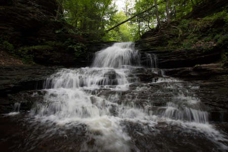 Scenic Waterfall in Ricketts Glen State Park in The Poconos in Pennsylvaniaの写真素材