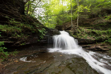 Scenic Waterfall in Ricketts Glen State Park in The Poconos in Pennsylvaniaの写真素材