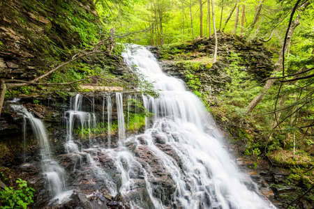 Scenic Waterfall in Ricketts Glen State Park in The Poconos in Pennsylvaniaの写真素材