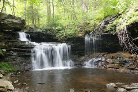 Scenic Waterfall in Ricketts Glen State Park in The Poconos in Pennsylvaniaの写真素材