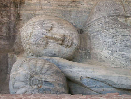 Statue of Buddha on heritage site "gal-vihara"  in the city to polonnaruwa in the Sri-Lankaの写真素材
