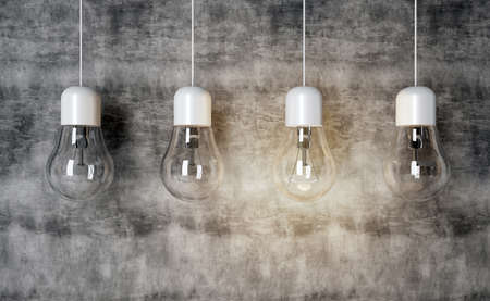 Lamp light bulbs on concrete background. Lamp illuminated. Light bulbs hang in modern interior. 3d rendering.の写真素材