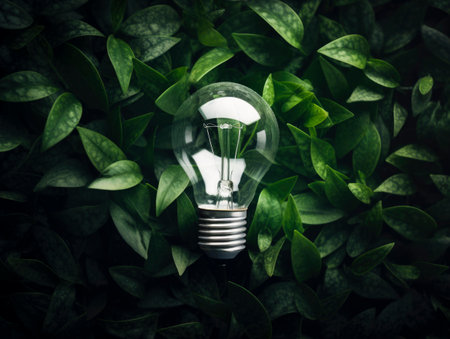 Lightbulb With Tree In Dirt Soil - Energy Development Concept. Generated AI.の素材