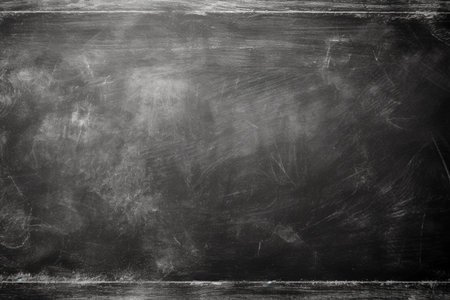 The blackboard in the classroom bears traces of usage, creating a textured background.の素材
