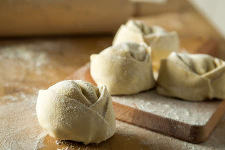 Handmade Italian tortelloni pasta with fillingの写真素材