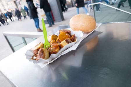 Currywurst sausage with curry sauce on food marketの写真素材