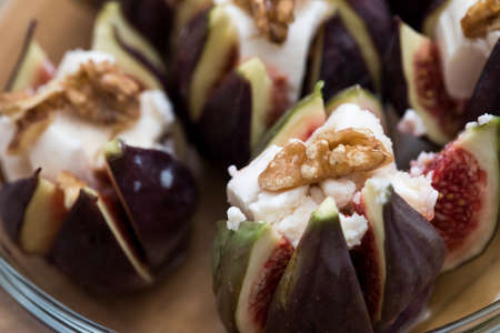 Filled figs with goat cheese with walnutの写真素材