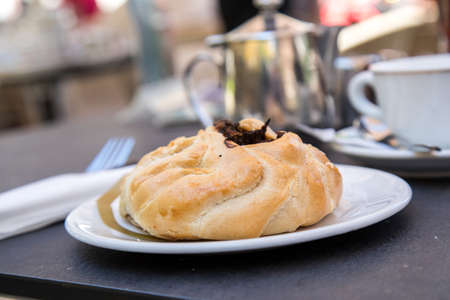 Traditional Maltese Qassata with spinach cheese filling in street cafe on Maltaの写真素材