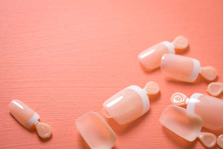Artificial false nails in French Nail design with white tipsの写真素材