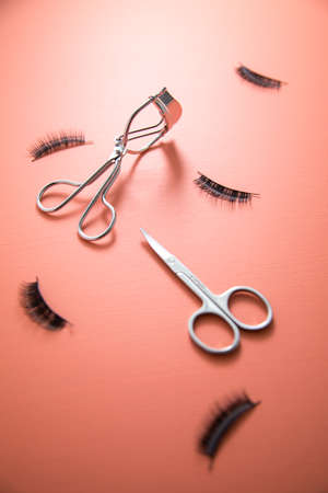 Lash curler and false lashes for eye make-upの写真素材