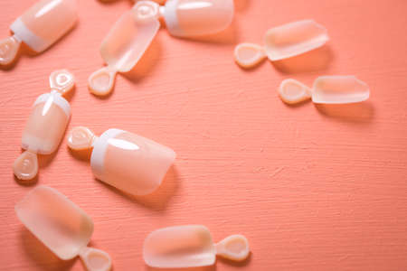 Artificial false nails in French Nail design with white tipsの写真素材