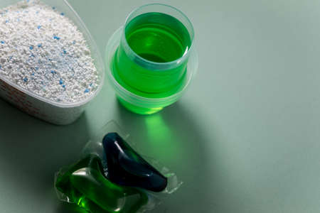 Laundry detergent sorts variety in powder, liquid gel and pod in washing doseの写真素材