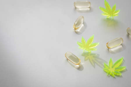 Pills, tablets,  capsules of cannabis marijuana hemp and CBD as pain killer and medical therapyの写真素材