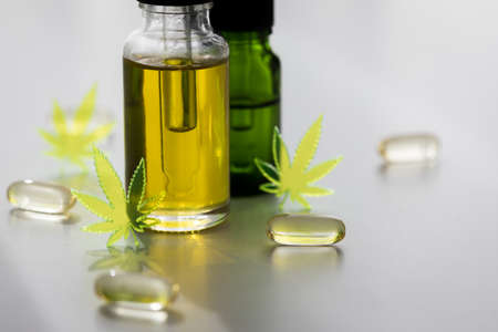 Pills, tablets,  capsules and oil of cannabis marijuana hemp and CBD as pain killer and medicalの写真素材