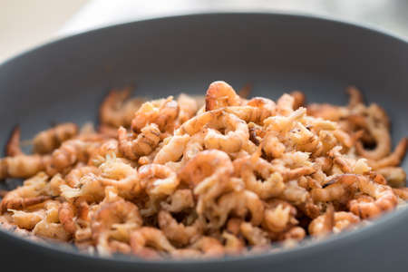 Peeled German Friesland north sea shrimps or crabs in bowlの写真素材