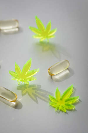 Pills, tablets,  capsules of cannabis marijuana hemp and CBD as pain killer and medical therapyの写真素材