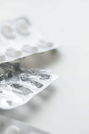 Empty pill blister on white backgroundの写真素材
