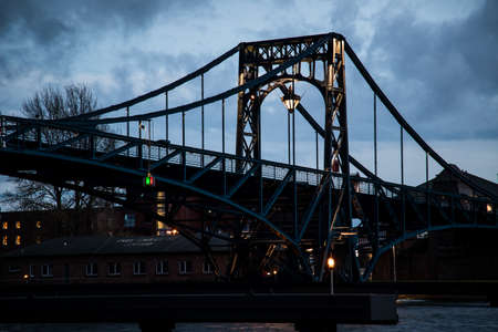 Kaiser-Wilhelm-Bridge a rotatable steel car bridge and landmark in Wilhelmshaven Germany during sunsetのeditorial素材