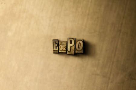 EXPO - close-up of grungy vintage typeset word on metal backdrop. Royalty free stock illustration.  Can be used for online banner ads and direct mail.の写真素材