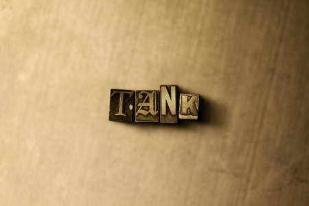 TANK - close-up of grungy vintage typeset word on metal backdrop. Royalty free stock illustration.  Can be used for online banner ads and direct mail.の写真素材