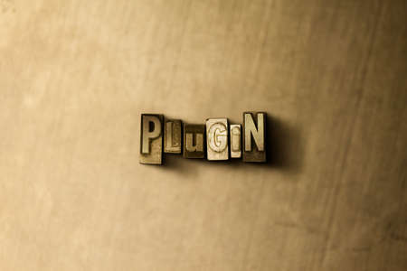 PLUGIN - close-up of grungy vintage typeset word on metal backdrop. Royalty free stock illustration.  Can be used for online banner ads and direct mail.の写真素材