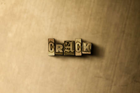 CRACK - close-up of grungy vintage typeset word on metal backdrop. Royalty free stock illustration.  Can be used for online banner ads and direct mail.の写真素材
