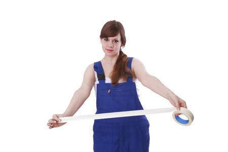 Young woman with tape rollの写真素材