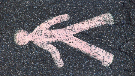 Walking sign on asphaltの写真素材