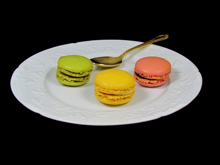 three macarons in a plateの写真素材
