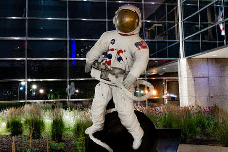 View of Grand Rapids astronaut sculpture at night - Michigan - USA