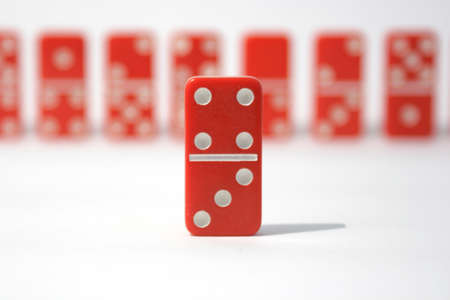 Red dominoes on a white background