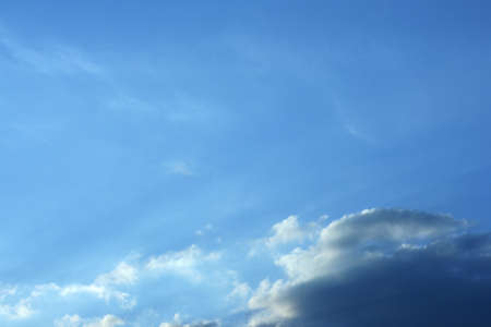 Blue sky with a few cloudsの写真素材