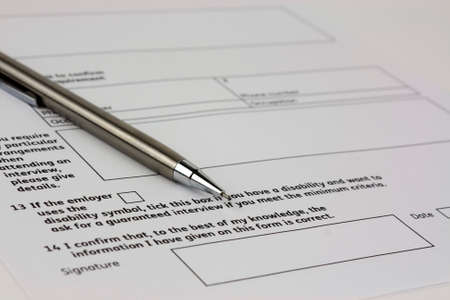 Close up of an application form to be completedの写真素材