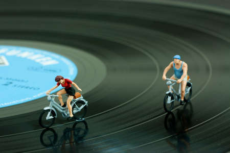 Model people having a cycle race on a recordの写真素材