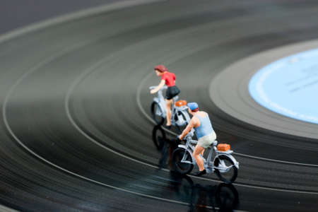 Model people having a cycle race on a recordの写真素材