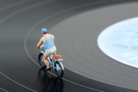 Model people having a cycle race on a recordの写真素材