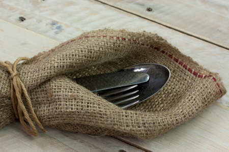 Rustic imageof cuttlery on a wooden backgroundの写真素材