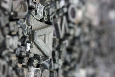 Close up of old used metal typeset lettersの写真素材