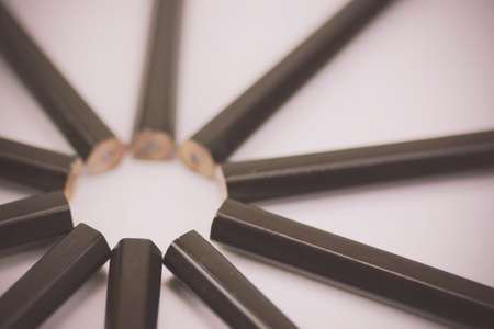 Close up of black pencils in a circle